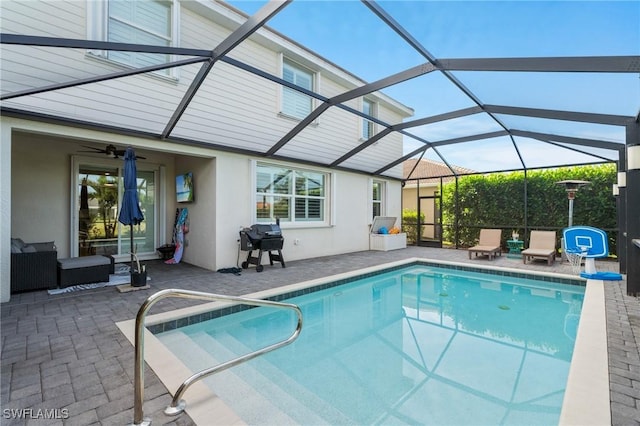 2165 Clementine St, Naples, FL 34120 - outdoor pool with a patio, glass enclosure, and an outdoor living space