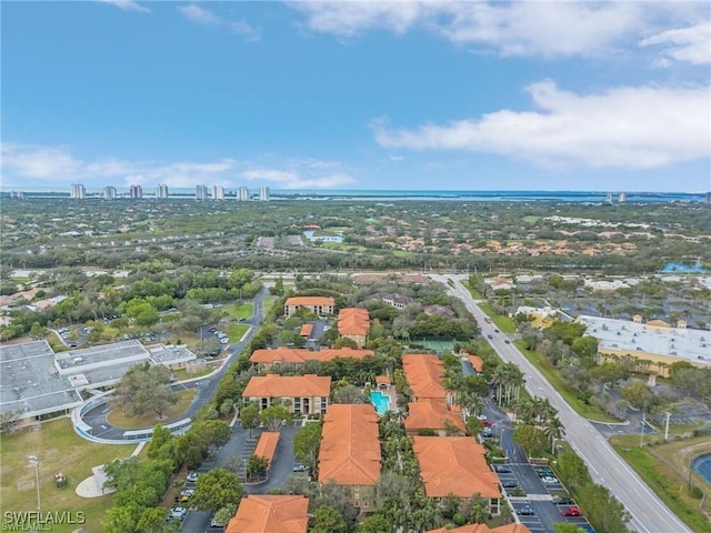 birds eye view of property featuring a city view