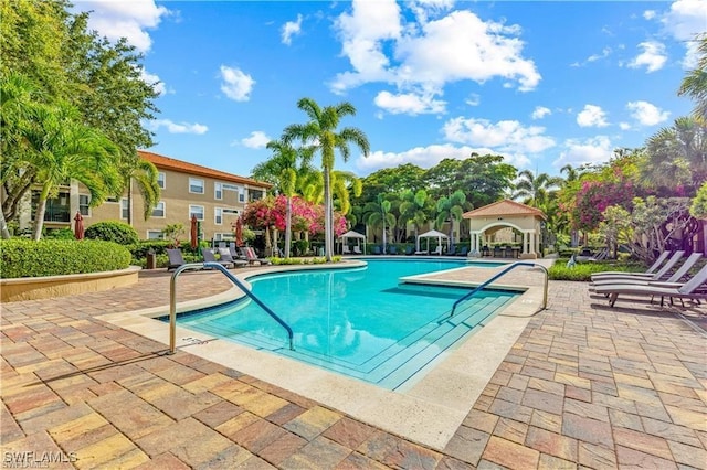 pool featuring a patio area
