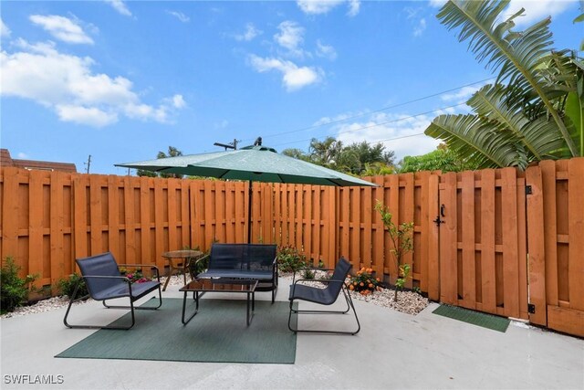view of patio with fence