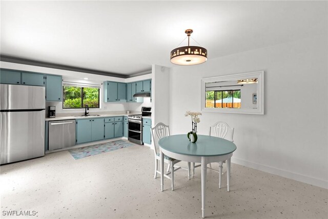 unfurnished dining area with a sink and baseboards