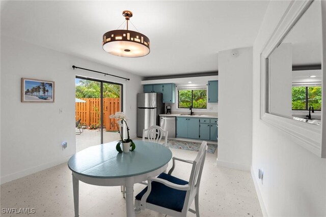 dining room with baseboards