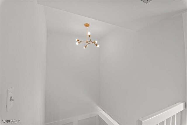 interior details with an inviting chandelier