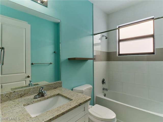 4324 22nd Ave SE, Naples, FL 34117 - bathroom with vanity, bathtub / shower combination, and toilet