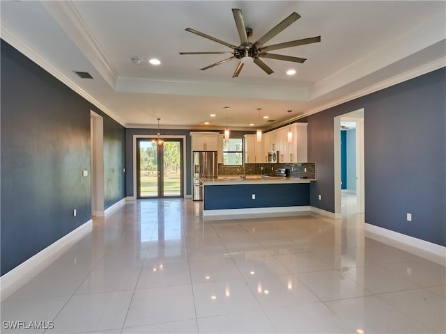 4324 22nd Ave SE, Naples, FL 34117 - unfurnished living room featuring visible vents, ornamental molding, ceiling fan, recessed lighting, and a sink
