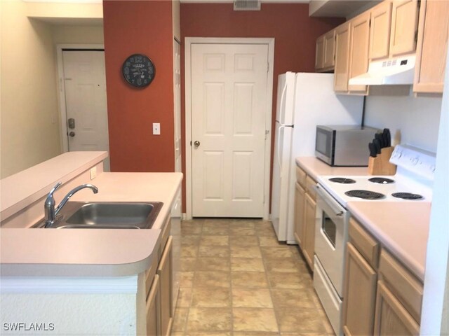 11510 Villa Grand Unit 418, Fort Myers, FL 33913 - kitchen featuring light countertops, a sink, white electric stove, under cabinet range hood, and stainless steel microwave