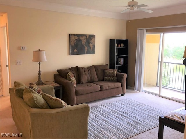 11510 Villa Grand Unit 418, Fort Myers, FL 33913 - living area featuring a ceiling fan and light carpet