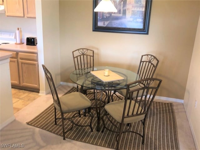 11510 Villa Grand Unit 418, Fort Myers, FL 33913 - dining room featuring baseboards