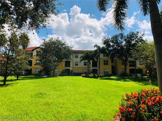 11510 Villa Grand Unit 418, Fort Myers, FL 33913 - view of property's community with a lawn