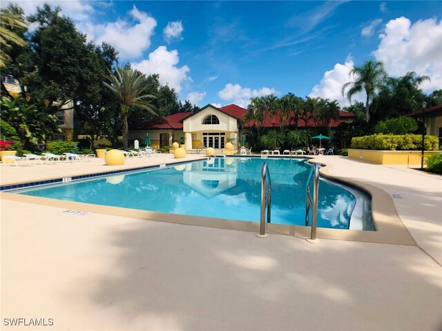 11510 Villa Grand Unit 418, Fort Myers, FL 33913 - community pool with a patio area