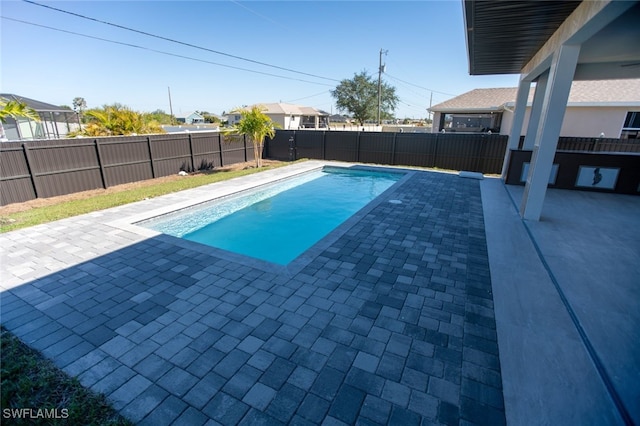 1817 NE 17th St, Cape Coral, FL 33909 - view of swimming pool with a fenced in pool, a patio area, and a fenced backyard