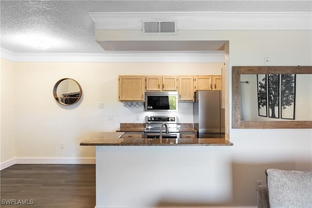 11520 Villa Grand Unit 1018, Fort Myers, FL 33913 - kitchen with dark wood-style flooring, baseboards, visible vents, dark stone counters, and stainless steel appliances