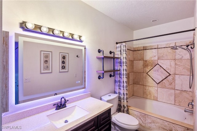 11520 Villa Grand Unit 1018, Fort Myers, FL 33913 - bathroom with shower / tub combo with curtain, vanity, a textured ceiling, and toilet