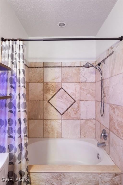 11520 Villa Grand Unit 1018, Fort Myers, FL 33913 - full bath featuring shower / bathtub combination with curtain, a textured ceiling, and toilet