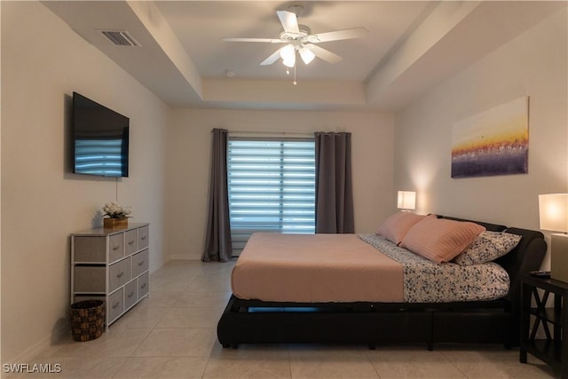 3318 SW 8th Pl, Cape Coral, FL 33914 - bedroom featuring a raised ceiling, baseboards, light tile patterned floors, and visible vents