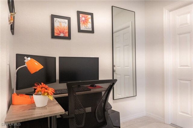 3318 SW 8th Pl, Cape Coral, FL 33914 - home office with light tile patterned floors and baseboards