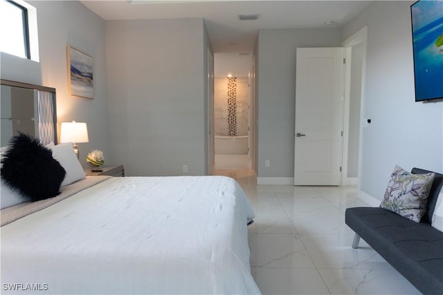 bedroom featuring marble finish floor, ensuite bath, baseboards, and visible vents
