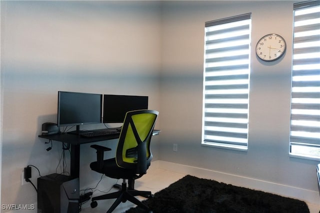 home office featuring baseboards