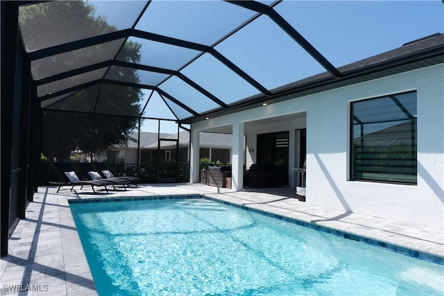 outdoor pool featuring a patio