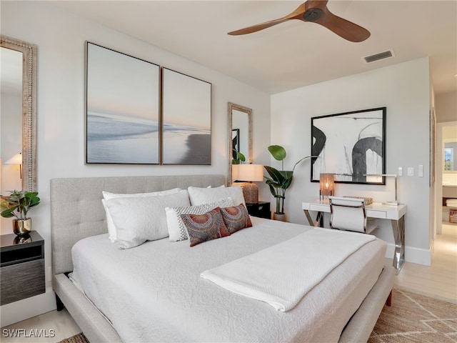365 5th Ave S Unit 307, Naples, FL 34102 - bedroom featuring ceiling fan and wood finished floors