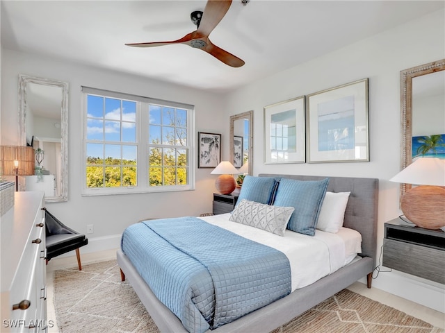 365 5th Ave S Unit 307, Naples, FL 34102 - bedroom featuring a ceiling fan