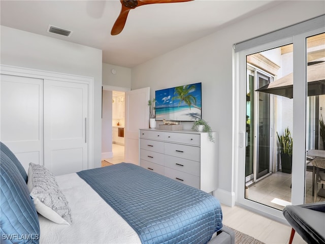 365 5th Ave S Unit 307, Naples, FL 34102 - bedroom featuring access to exterior, ceiling fan, a closet, light wood-style flooring, and baseboards