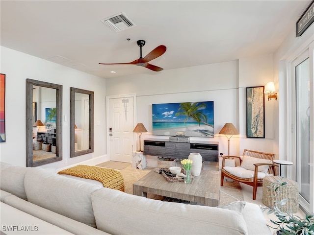 365 5th Ave S Unit 307, Naples, FL 34102 - living area with a ceiling fan and baseboards