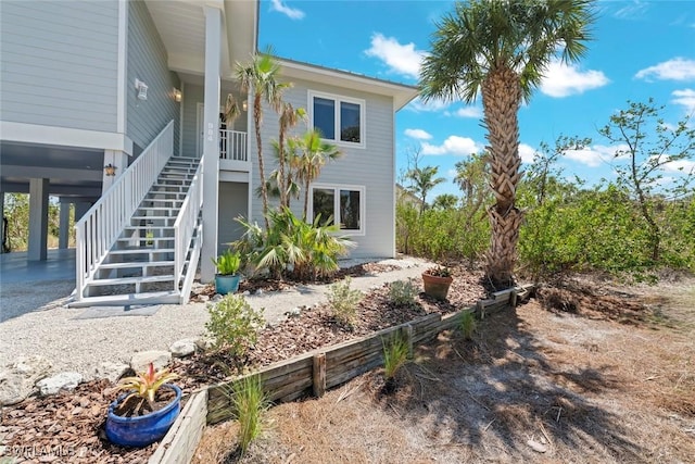 984 Black Skimmer Way, Sanibel, FL 33957 - exterior space featuring covered porch and stairway