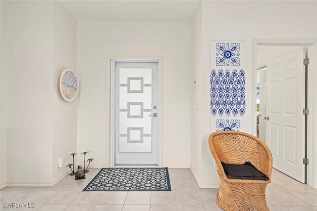 984 Black Skimmer Way, Sanibel, FL 33957 - foyer entrance featuring light tile patterned floors and baseboards