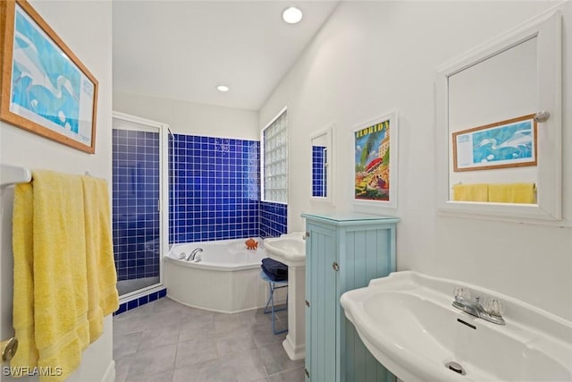 984 Black Skimmer Way, Sanibel, FL 33957 - bathroom with a sink, a shower stall, tile patterned flooring, a bath, and recessed lighting