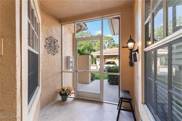view of unfurnished sunroom