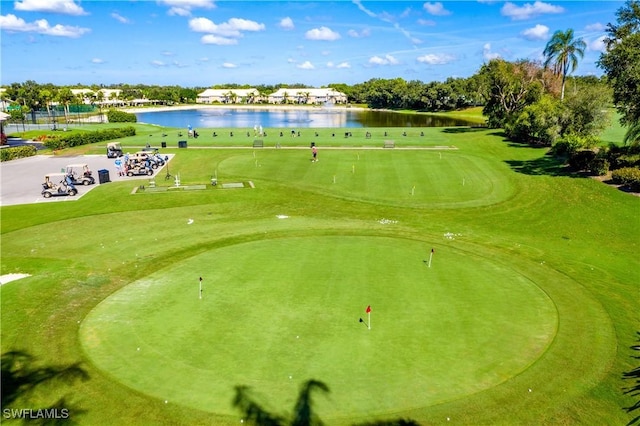 view of community featuring a water view and golf course view