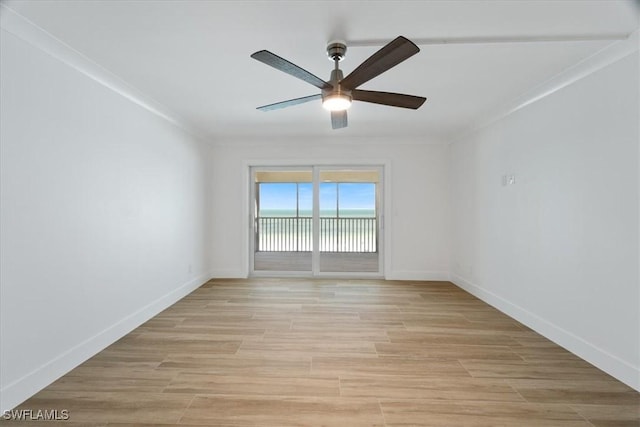 100 Estero Blvd Unit 633, Fort Myers Beach, FL 33931 - unfurnished room featuring ceiling fan, ornamental molding, baseboards, and light wood-type flooring
