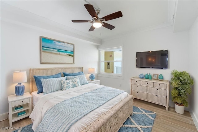 100 Estero Blvd Unit 633, Fort Myers Beach, FL 33931 - bedroom featuring light wood-style floors, a ceiling fan, and baseboards