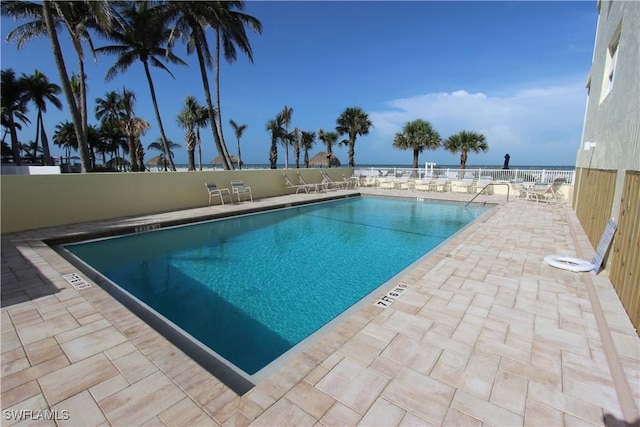 100 Estero Blvd Unit 633, Fort Myers Beach, FL 33931 - community pool featuring a patio area and a water view