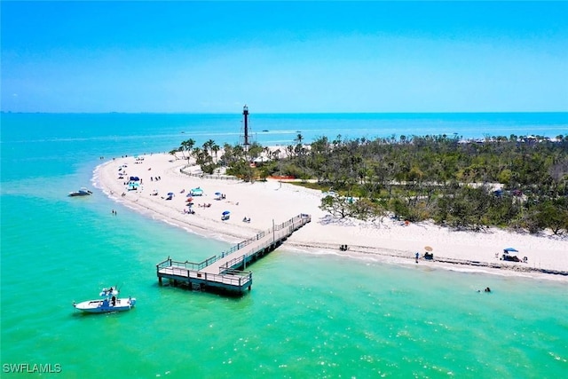 aerial view of waterfront with a beach