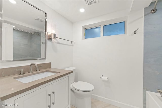 full bath with toilet, vanity, baseboards, and recessed lighting