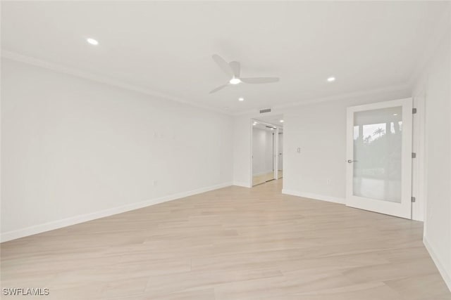 empty room with ornamental molding, ceiling fan, light wood-style flooring, recessed lighting, and baseboards