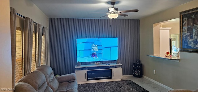 8051 Primrose Blvd, Labelle, FL 33935 - living area with light tile patterned floors, ceiling fan, and an accent wall