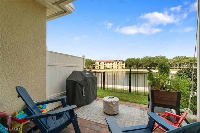 12605 Laurel Cove Dr, Fort Myers, FL 33913 - view of patio / terrace with a grill and fence