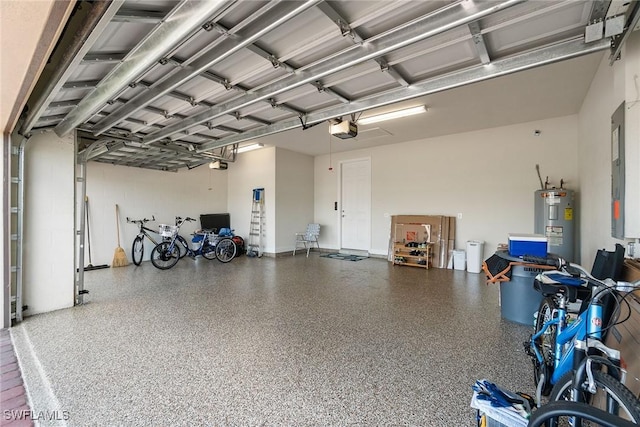 garage featuring electric water heater and a garage door opener