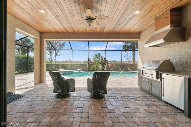 view of patio with a lanai, a grill, ceiling fan, a pool with connected hot tub, and area for grilling