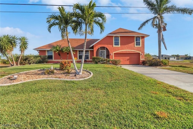 321 NW 19th Ter, Cape Coral, FL 33993 - traditional-style home featuring stucco siding, an attached garage, concrete driveway, and a front lawn