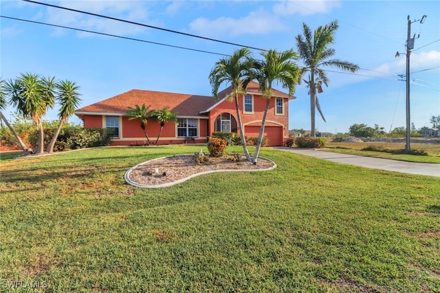 321 NW 19th Ter, Cape Coral, FL 33993 - view of front of home with driveway, stucco siding, an attached garage, and a front lawn