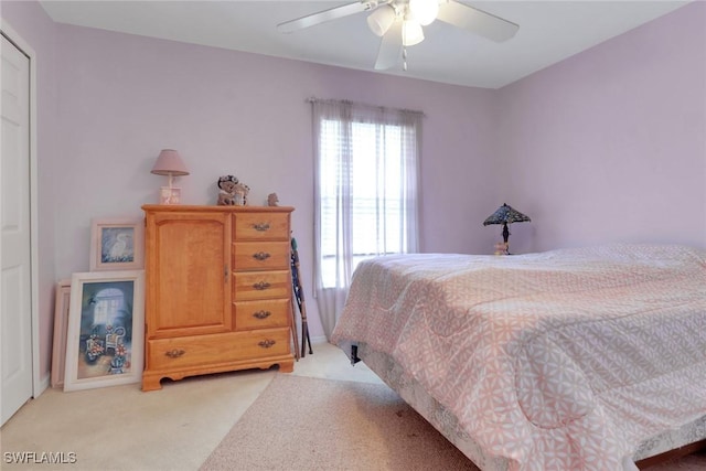 321 NW 19th Ter, Cape Coral, FL 33993 - bedroom featuring light carpet and a ceiling fan