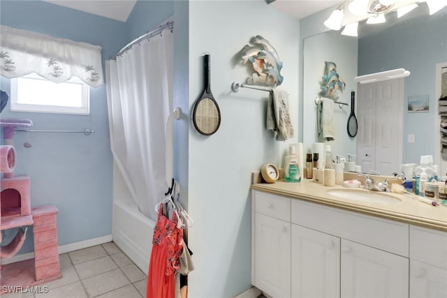 321 NW 19th Ter, Cape Coral, FL 33993 - full bathroom featuring vanity, tile patterned flooring, and shower / bath combination with curtain