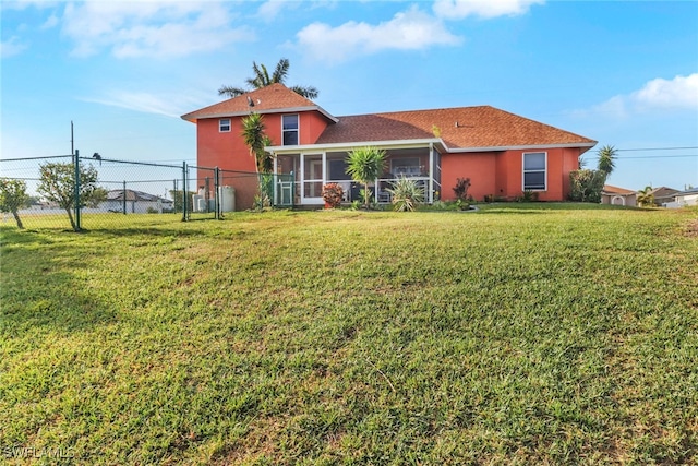 321 NW 19th Ter, Cape Coral, FL 33993 - back of house featuring a sunroom and stucco siding