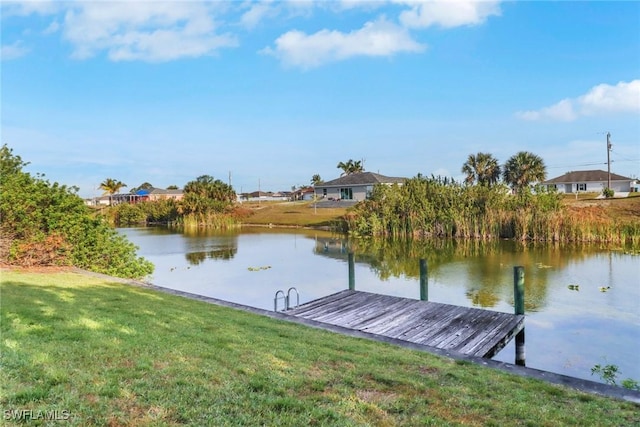 321 NW 19th Ter, Cape Coral, FL 33993 - dock with a water view, a yard, and a residential view