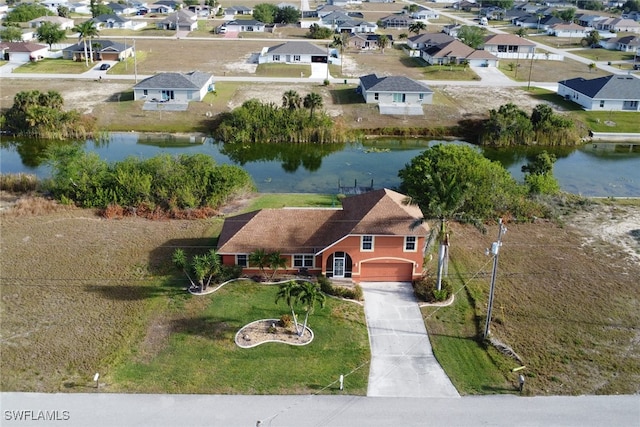 321 NW 19th Ter, Cape Coral, FL 33993 - aerial perspective of suburban area with a nearby body of water