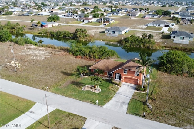 321 NW 19th Ter, Cape Coral, FL 33993 - aerial perspective of suburban area featuring a nearby body of water